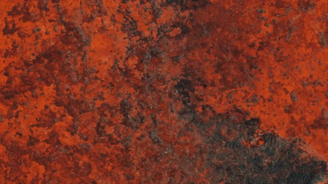 Aerial of active volcano erupting red hot magma