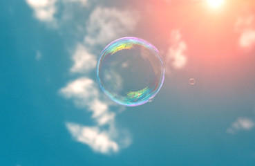 soap bubbles into the sunset with beautiful bokeh.close-up
