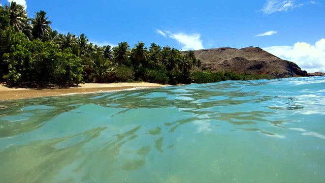 Deserted Pacific shoreline tropical beach turquois ocean Marquesas 