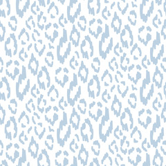 Abstract seamless leopard skin vector pattern in light blue color.