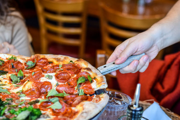 Slice of pepperoni pizza