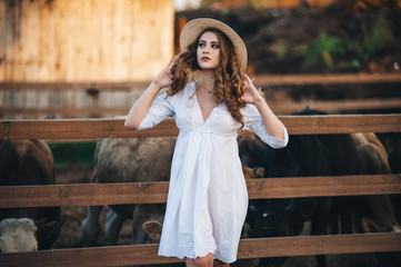 The girl in the white dress on the farm.