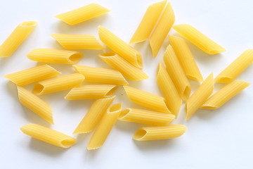 Penne pasta isolated on white background