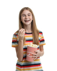 Teenage girl with popcorn during cinema show on white background