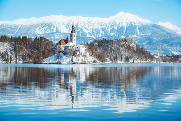 Lake Bled with Bled Island and Castle at sunrise in winter, Slovenia