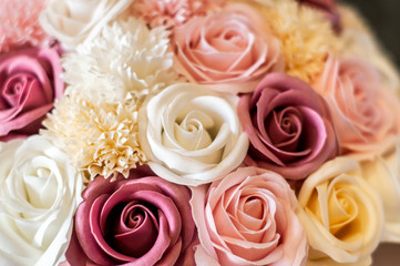 Congratulations on the birth of the baby: Pink box with multi-colored flower buds.