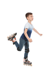 Little boy with inline roller skates on white background