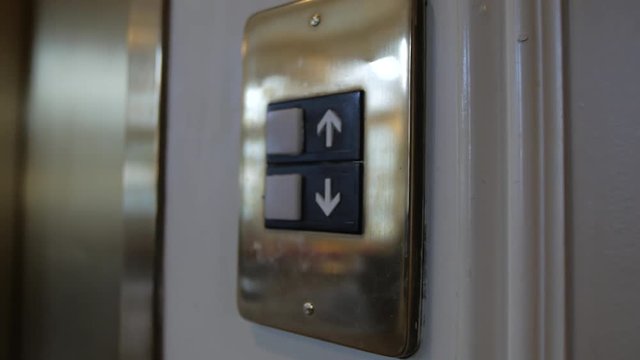 Slow move in to elevator button