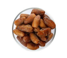 Bowl with sweet dates on white background, top view. Dried fruit as healthy snack