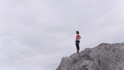 Aerial female climber rock climbing Squamish Valley Canada