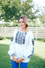 Beautiful young woman in traditional ethnic ukrainian  style