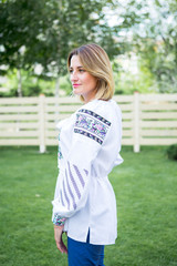 Portrait of young woman in traditional ukrainian ethnic  style