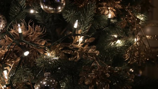 Christmas Tree ornaments close gold shiny