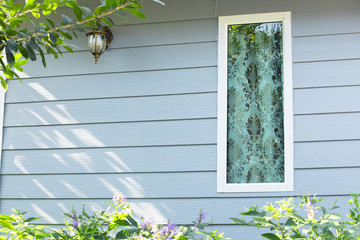 Fototapeta na wymiar Window of Modern house with,Home window with nature ,Morning window