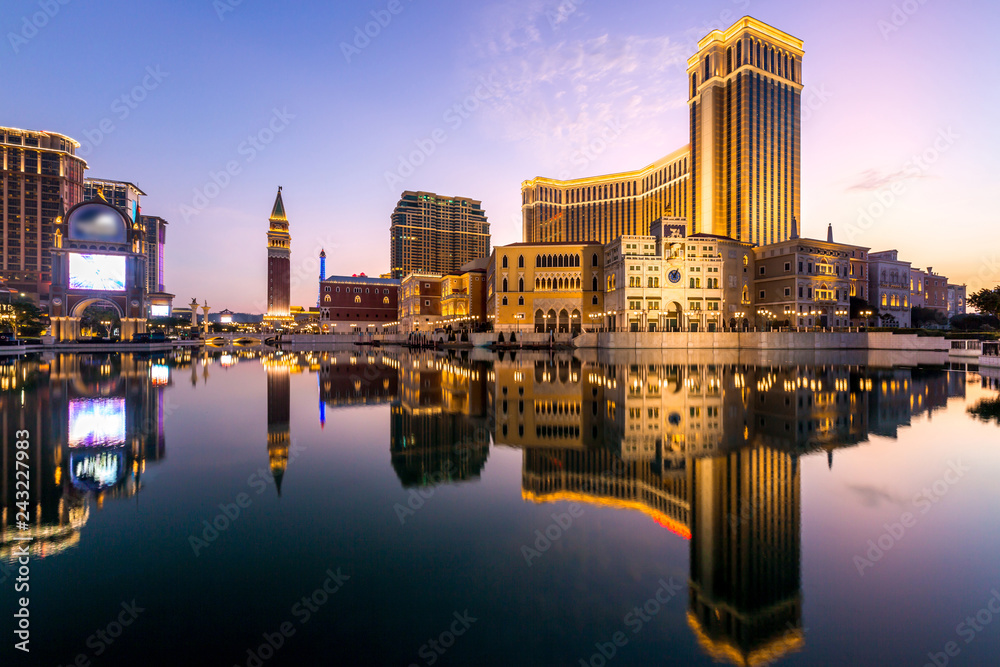 Wall mural Macau cityscape at night, all hotel and casino are colorful lighten up with twilight sky, Macau, China.