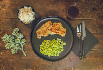 Complete dinner on wooden table 