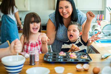 Family with fresh homemade cucakes