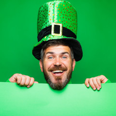 Lucky Patricks day. Man on green background celebrate St Patricks Day. Man in Saint Patrick's Day...