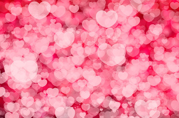 White Heart Bokeh on Pink color Background for Valentine's Day Concept