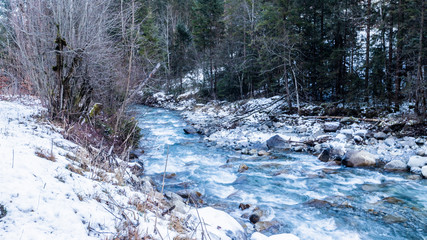 Fototapeta na wymiar a creek in a valley in Switzerland