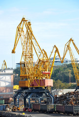 Crane, freight train and scrap metal