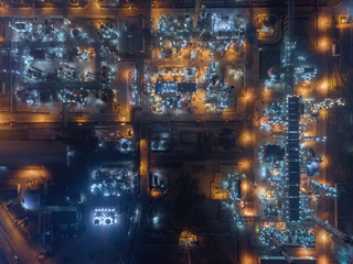 Aerial top view Oil refinery factory at night for energy or gas industry.