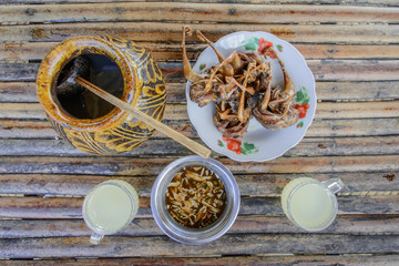 photo of palm juice and fried meat