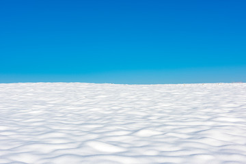 Horizon line over snowy field