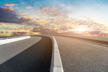 Fototapeta premium Sky Highway Asphalt Road and beautiful sky sunset scenery