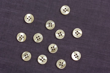 mother of pearl buttons in grey denim