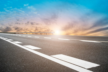 Fototapeta premium Sky Highway Asphalt Road and beautiful sky sunset scenery