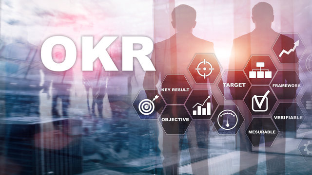 OKR - objective key result concept. Mixed media on a virtual structured screen. Project management.