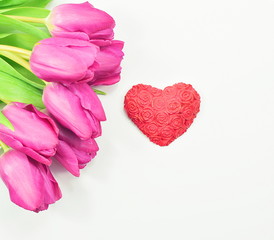 Valentines Day background with purple tulips and red heart