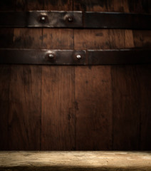 background of barrel and worn old table of wood