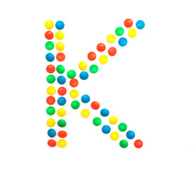 Multicolored alphabet from children's mosaic letter K