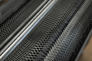 Cheese-making equipment close-up in production of hard cheese background