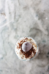 Ice cream with cherry berries on  beautiful marble countertop background