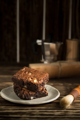 brownie chocolate macadamia dessert baked sweet on wood background
