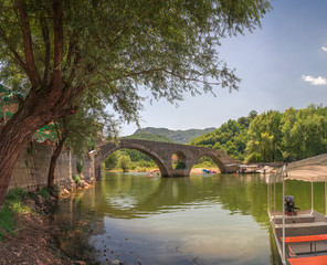 Fototapeta na wymiar Old Bridge over Crnojevica river in Montenegro
