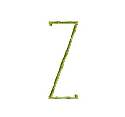 Capital letter Z made of green bamboo poles on white background.