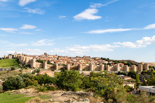 Panoramic view of the historic city of Avila from the Mirador of Cuatro Postes, Spain, with its famous medieval town walls. UNESCO World Heritage. Called the Town of Stones and Saints