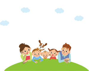 Obraz na płótnie Canvas 芝生に横たわる幸せ家族
