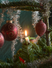 Closeup into a decorated Christmas tree decorated in retro danish style.