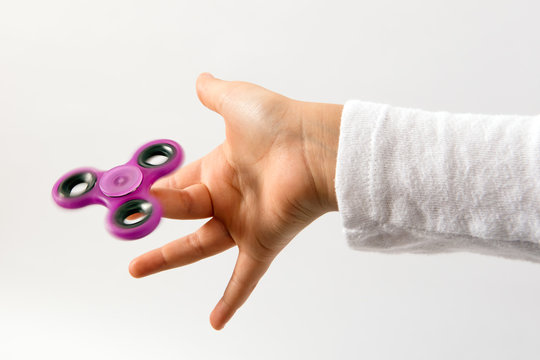 Spinner Toy Spinning On Kids Finger