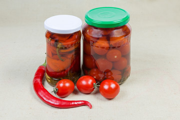 Canned and fresh peppers chili and cherry tomatoes
