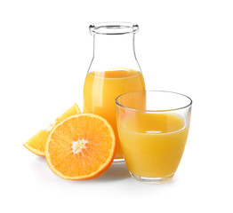 Glass and bottle of fresh orange juice on white background