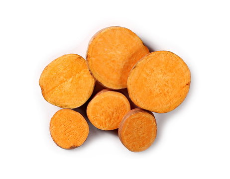 Sweet potato slices isolated on white background, top view