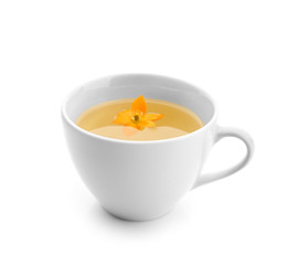 Cup of hot tea on white background