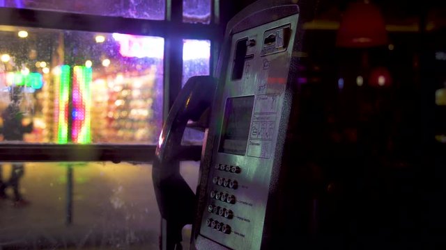 London red telephone booth night street illumination