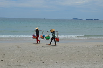 Vietnamese sales women on the beach